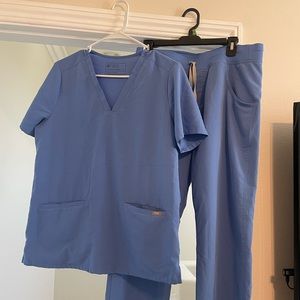 FIGS ceil blue scrubs. Top and bottom